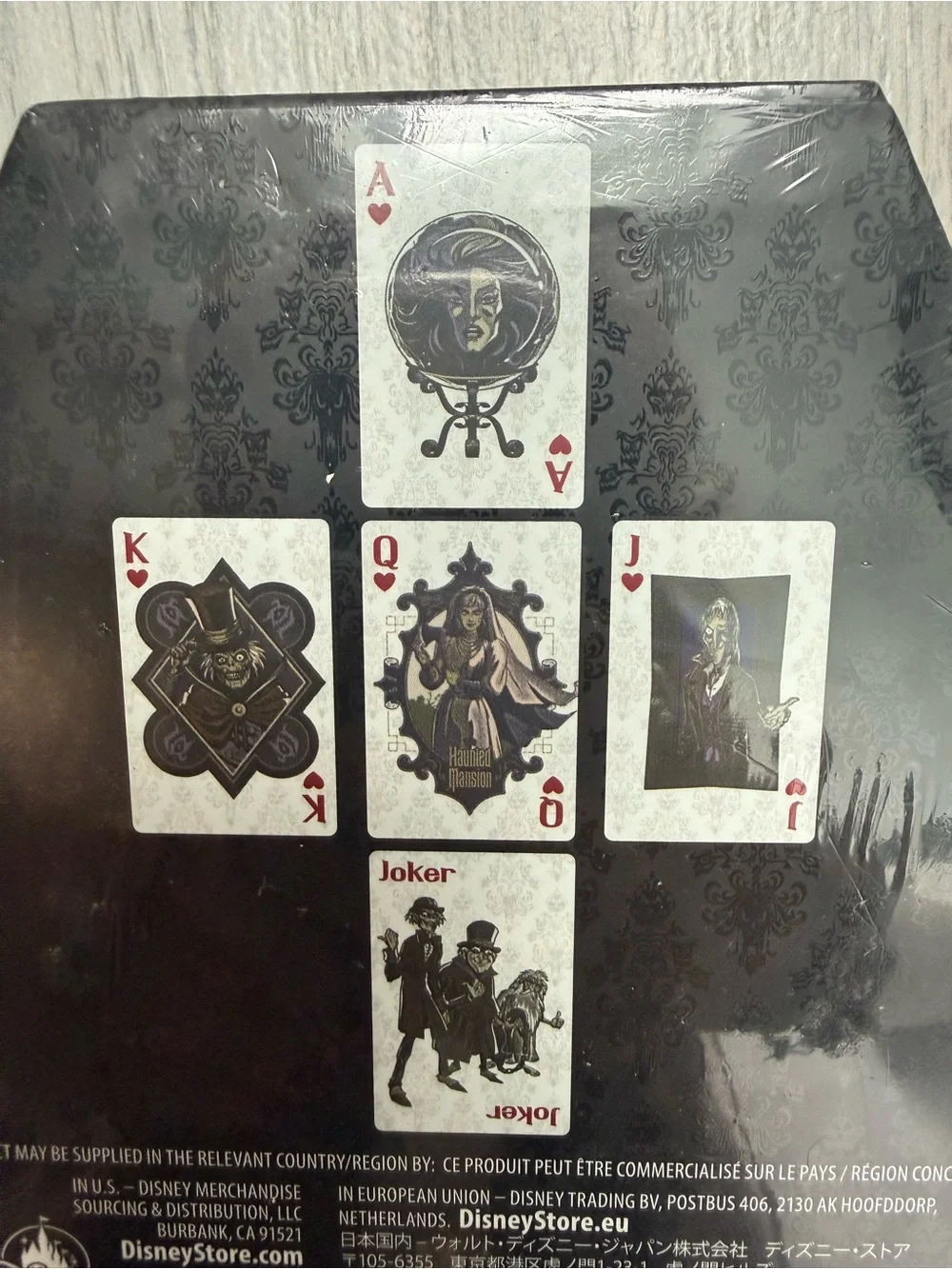 The Haunted Mansion Playing Cards 52 coated card deck in Coffin NIB